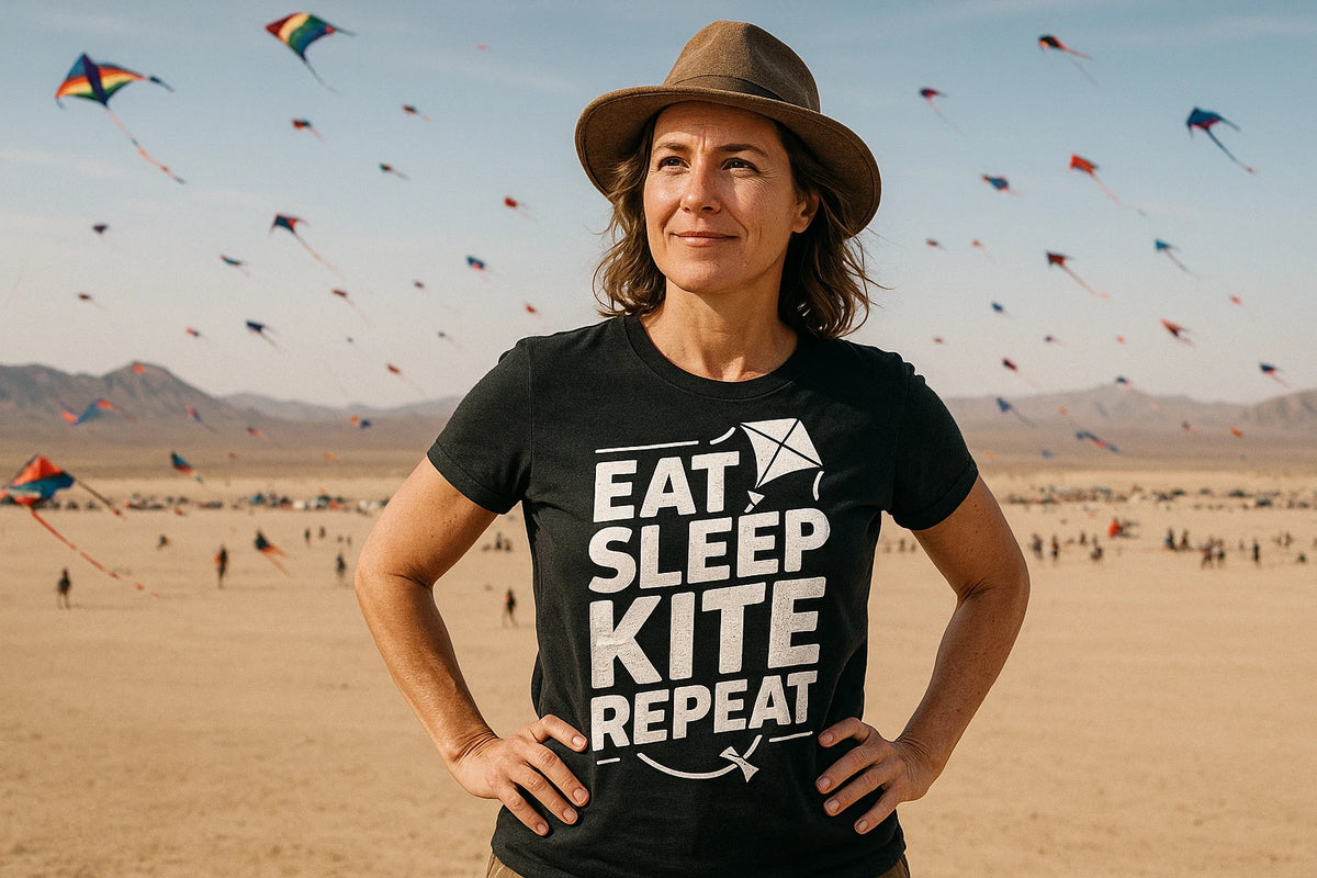 Lifestyle shot of the "Eat Sleep Kite Repeat" black kite flying t shirt in a real-world setting