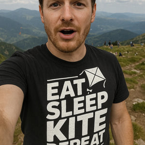 "Eat Sleep Kite Repeat" black kite flying t shirt, photographed as kite flying gift