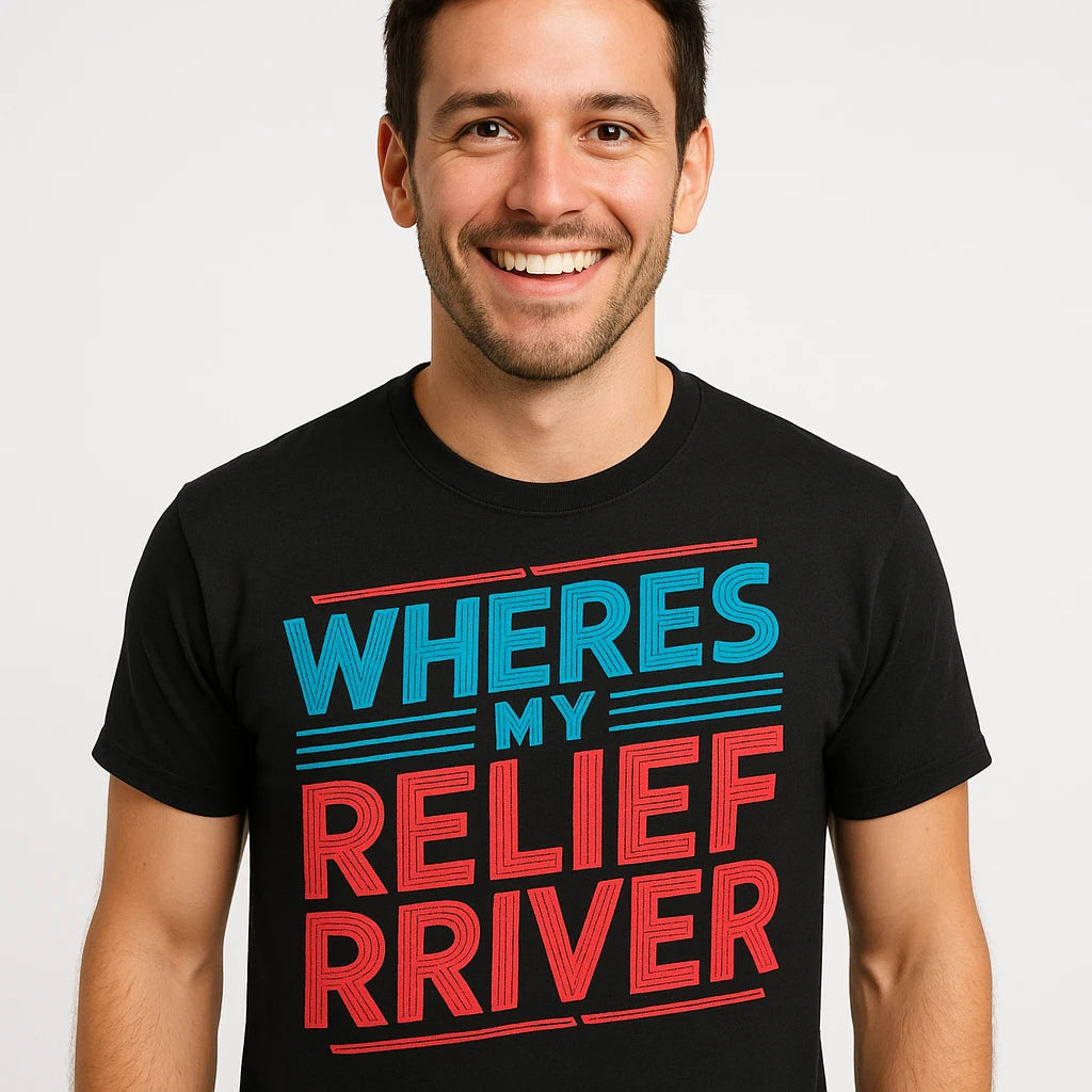 Close-up of the "Wheres My Relief Driver" red print on a premium Bella+Canvas black bus driver t shirt