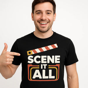 Close-up of the "Scene It All" white print on a premium Bella+Canvas black graphic tee