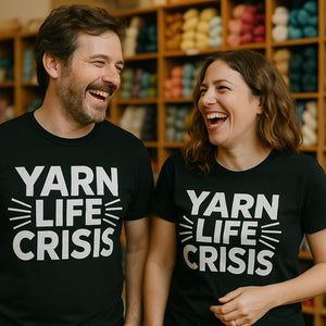 Person wearing the black knitting t shirt graphic tee - "Yarn Life Crisis" design