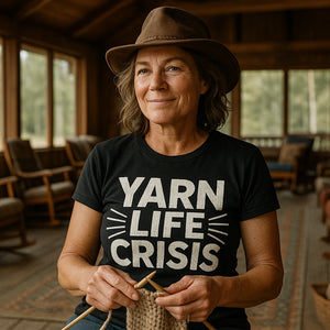 Lifestyle shot of the "Yarn Life Crisis" black knitting t shirt in a real-world setting