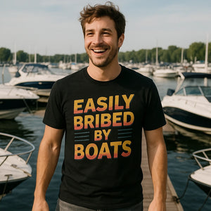 Lifestyle shot of the "Easily Bribed By Boats" black t shirt boat neck in a real-world setting