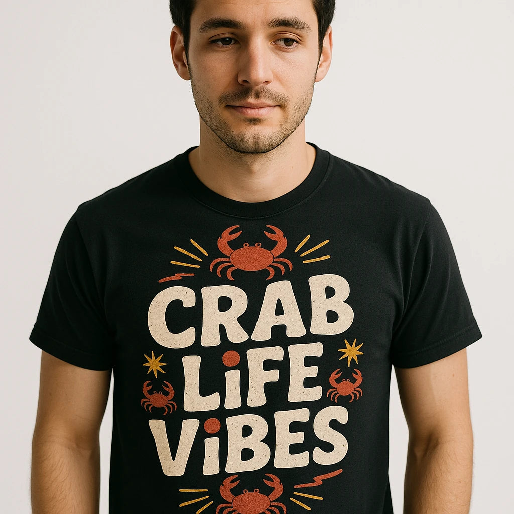 A person wearing a black t-shirt with the words "CRAB LIFE VIBES" printed on it, accompanied by illustrations of red crabs and decorative lines. The person has short dark hair and a neutral expression.