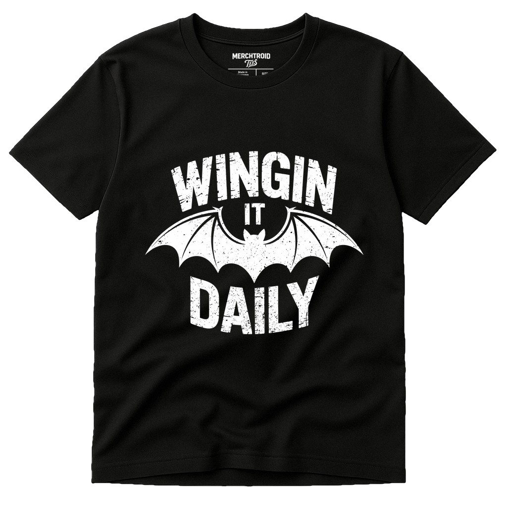 Black Batwing Tshirt - "Wingin It Daily" graphic tee with white print, flat lay product photo