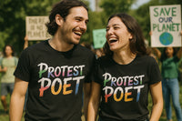 A man and a woman are smiling and wearing matching black T-shirts with the words 