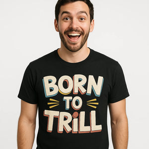 Close-up of the "Born To Trill" cream print on a premium Bella+Canvas black piano t shirt