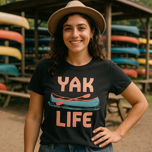 Lifestyle shot of the "Yak Life" black canoeing t shirt in a real-world setting