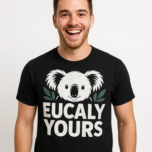 Close-up of the "Eucaly Yours" white print on a premium Bella+Canvas black koala tee shirts