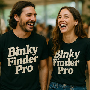 Person wearing the black baby gear chaos t shirt graphic tee - "Binky Finder Pro" design
