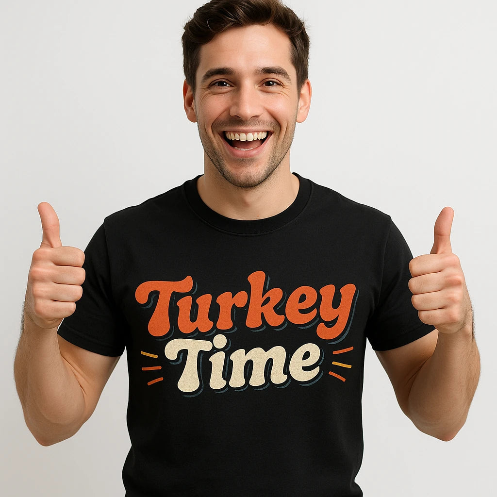 A person is smiling broadly and giving two thumbs up, wearing a black T-shirt with the phrase "Turkey Time" in large, colorful letters. The background is plain white.