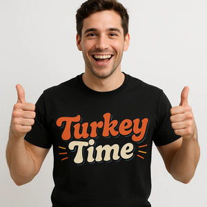 Close-up of the "Turkey Time" orange print on a premium Bella+Canvas black thanksgiving t shirt women's