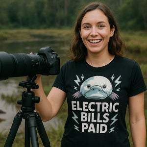 Lifestyle shot of the "Electric Bills Paid" black platypus shirts in a real-world setting