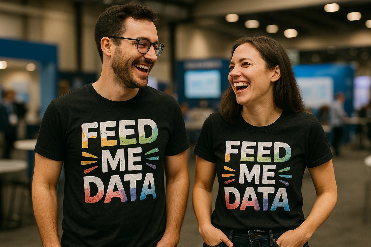 Person wearing the black marketing manager t shirt graphic tee - "Feed Me Data" design