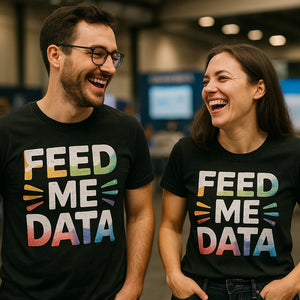 Person wearing the black marketing manager t shirt graphic tee - "Feed Me Data" design