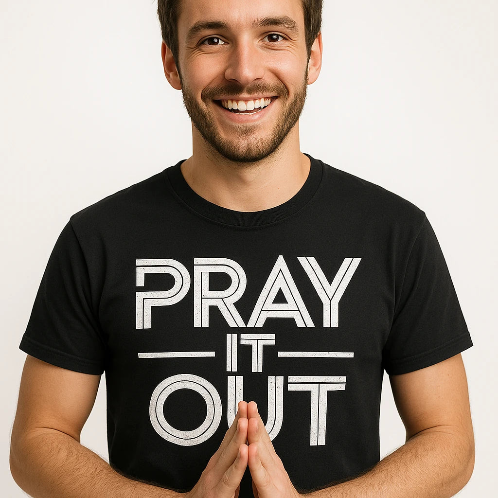 Close-up of the "Pray It Out" white print on a premium Bella+Canvas black men's faith shirts