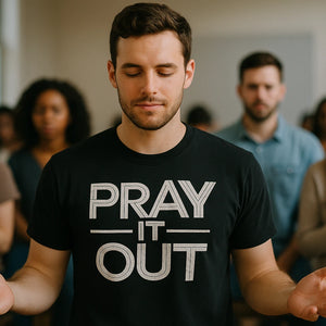 Lifestyle shot of the "Pray It Out" black men's faith shirts in a real-world setting