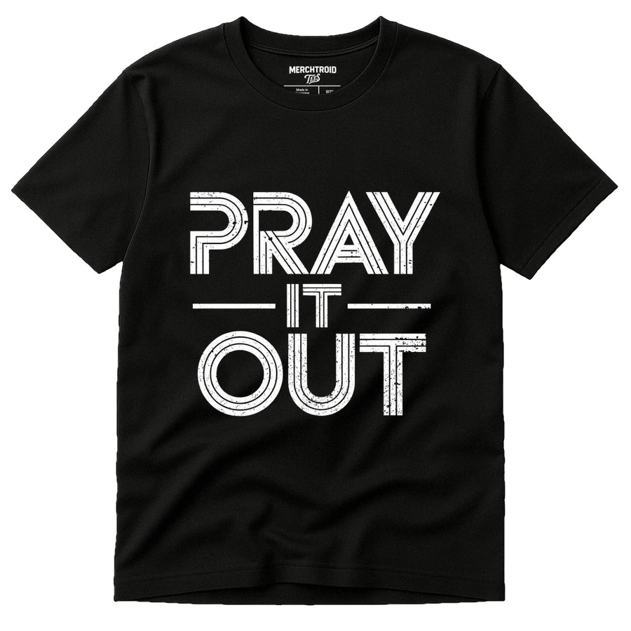A black T-shirt with bold, white text reading "PRAY IT OUT" in a distressed font. The shirt label shows sizes available, and the brand is "MERCHTROID."