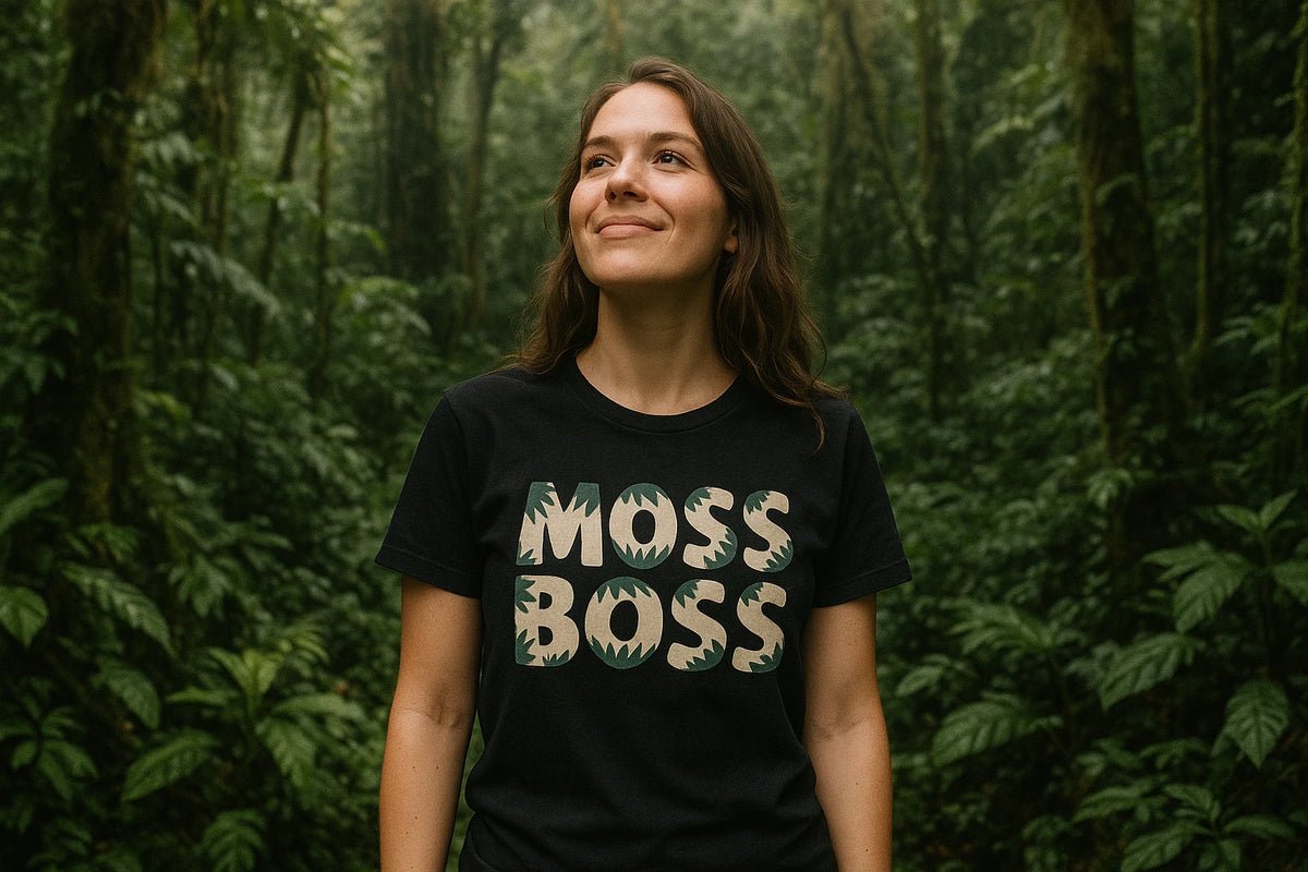 Lifestyle shot of the "Moss Boss" black hoh rainforest t shirt in a real-world setting