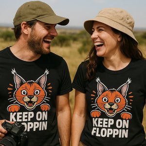 Person wearing the black caracal t shirt graphic tee - "Keep on Floppin" design