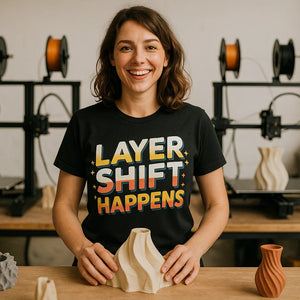 Lifestyle shot of the "Layer Shift Happens" black 3d printing shirts in a real-world setting