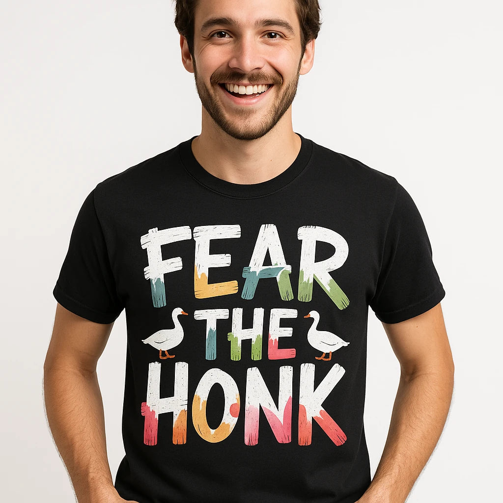 Close-up of the "Fear the Honk" white print on a premium Bella+Canvas black geese shirts