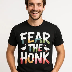 Close-up of the "Fear the Honk" white print on a premium Bella+Canvas black geese shirts