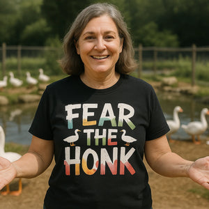 Lifestyle shot of the "Fear the Honk" black geese shirts in a real-world setting