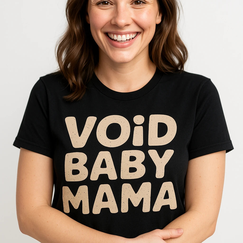 Close-up of the "Void Baby Mama" beige print on a premium Bella+Canvas black cat lovers t shirt