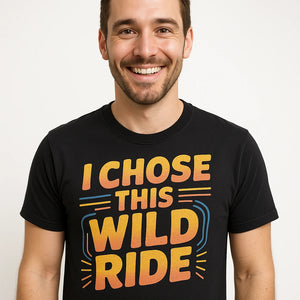 Close-up of the "I Chose This Wild Ride" gold print on a premium Bella+Canvas black relationships shirts