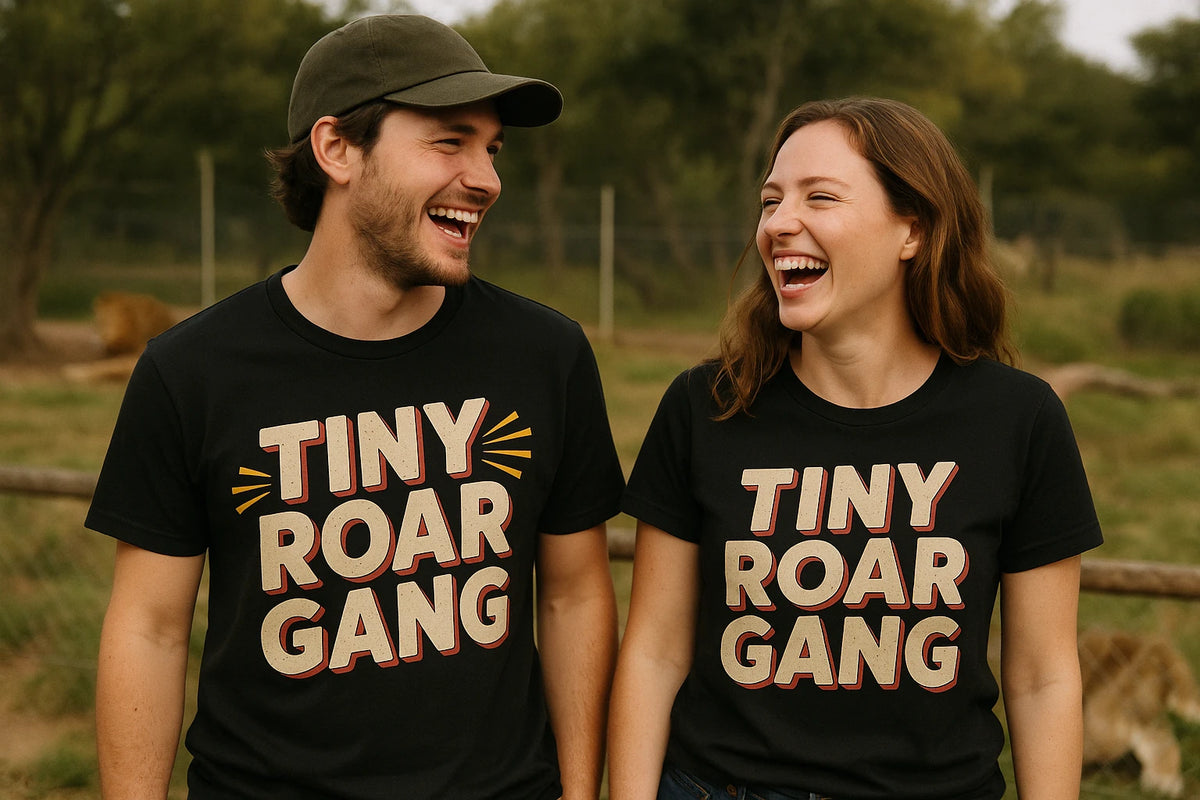Person wearing the black bobcats t shirt graphic tee - "Tiny Roar Gang" design