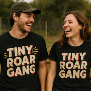 Person wearing the black bobcats t shirt graphic tee - "Tiny Roar Gang" design