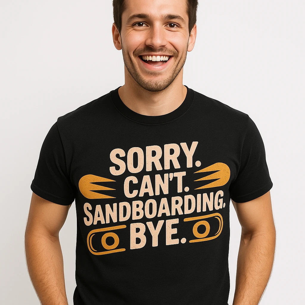 Close-up of the "Sorry. Cant. Sandboarding. Bye." beige print on a premium Bella+Canvas black sandboarding t shirt