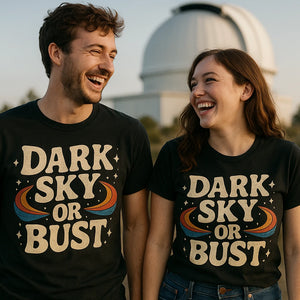 Person wearing the black stargazing t shirt graphic tee - "Dark Sky Or Bust" design