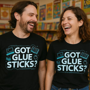 Person wearing the black teacher tee shirts graphic tee - "Got Glue Sticks?" design