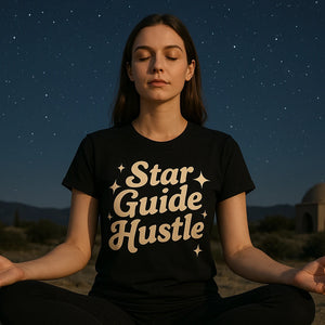 Lifestyle shot of the "Star Guide Hustle" black astrology shirts in a real-world setting