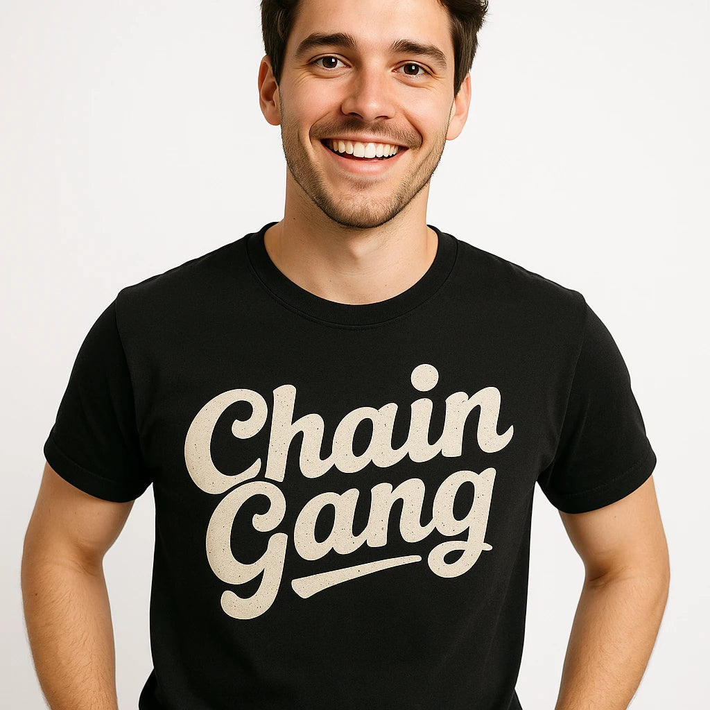 Close-up of the "Chain Gang" cream print on a premium Bella+Canvas black jewelry making t shirt