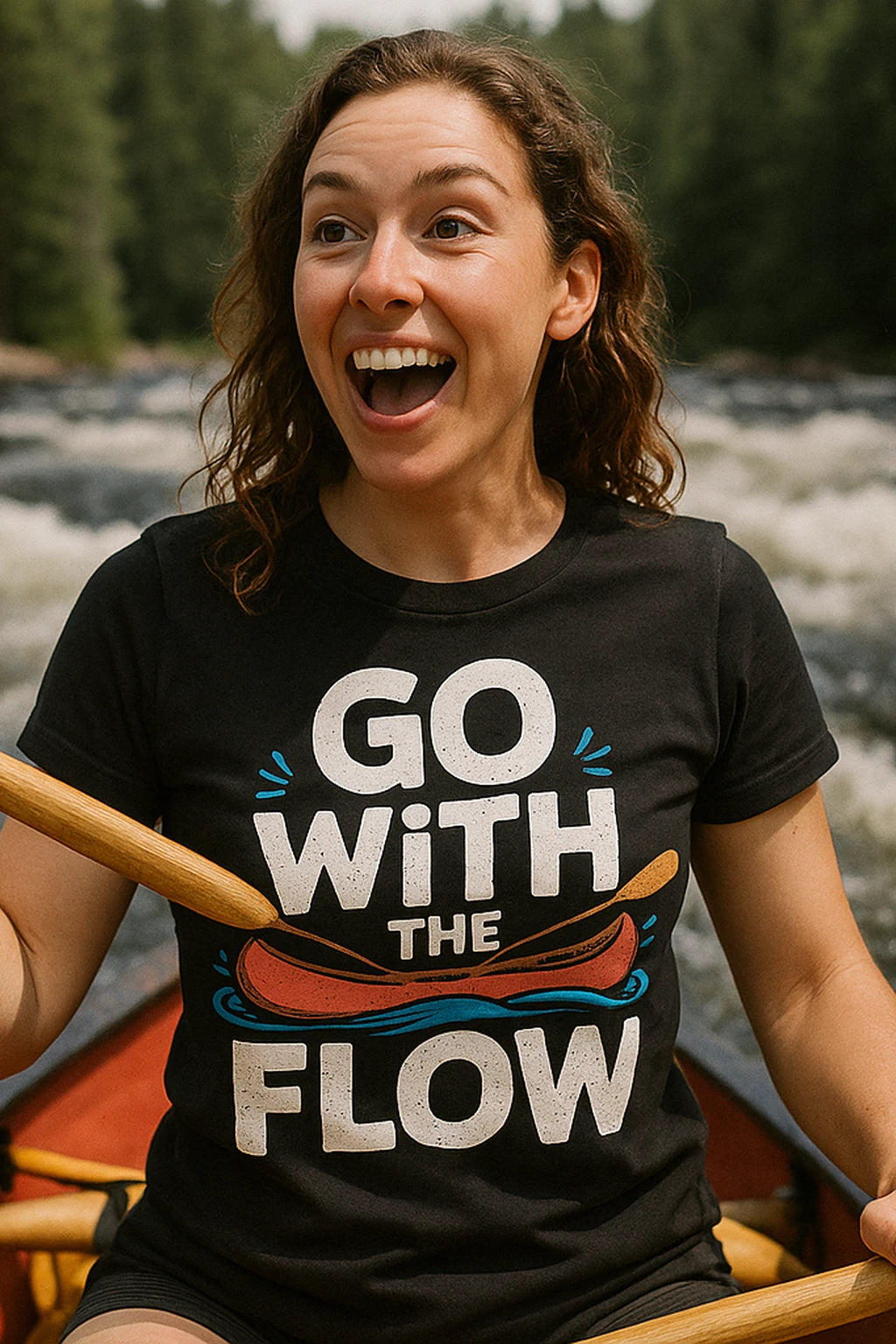 "Go With the Flow" black beaver canoe t shirt, photographed as canoeing lover gift