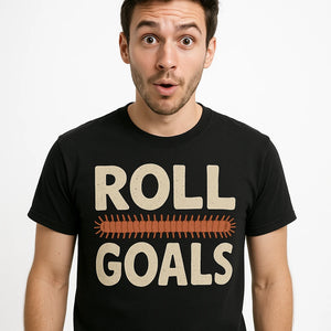 Close-up of the "Roll Goals" beige print on a premium Bella+Canvas black millipede t shirt