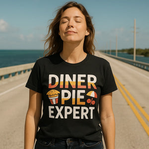 Lifestyle shot of the "Diner Pie Expert" black road trip tee shirts in a real-world setting