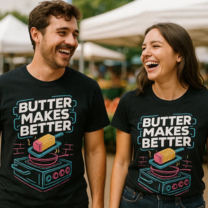 Person wearing the black cook out t shirt graphic tee - "Butter Makes Better" design