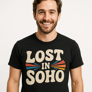 Close-up of the "Lost in Soho" beige print on a premium Bella+Canvas black london shirts