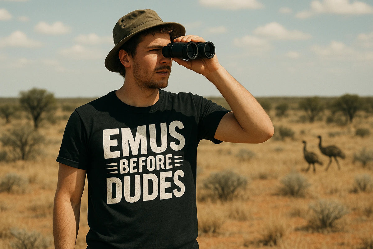 Lifestyle shot of the "Emus Before Dudes" black emus t shirt in a real-world setting