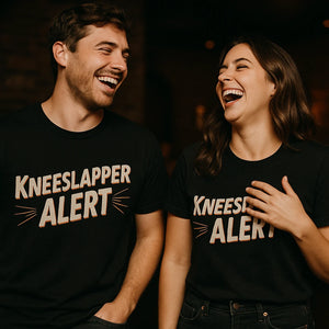Person wearing the black comedy t shirt graphic tee - "Kneeslapper Alert" design