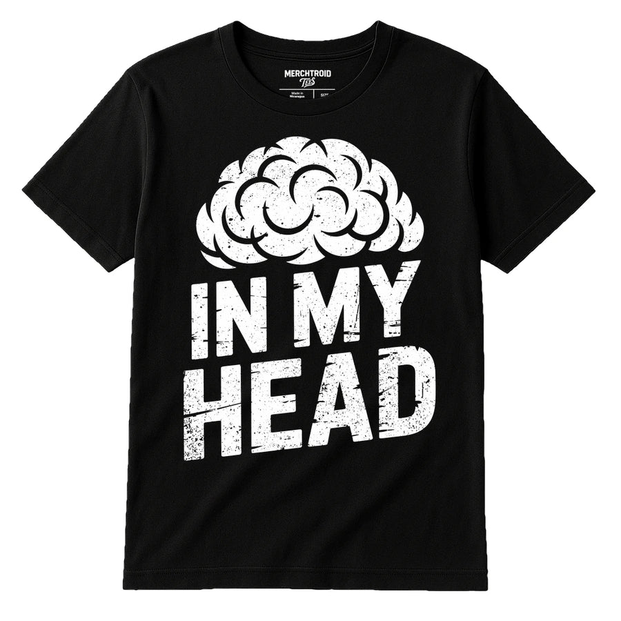 A black t-shirt with a white graphic of a stylized brain above the bold text "IN MY HEAD." The design has a distressed texture.