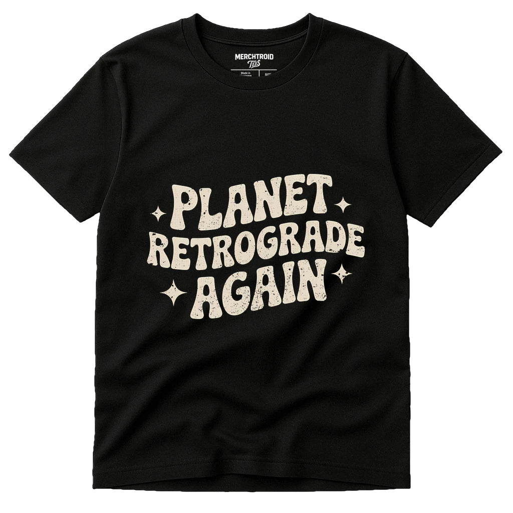 Black Cancer T Shirts Astrology - "Planet Retrograde Again" graphic tee with cream print, flat lay product photo