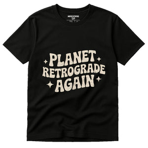Black Cancer T Shirts Astrology - "Planet Retrograde Again" graphic tee with cream print, flat lay product photo