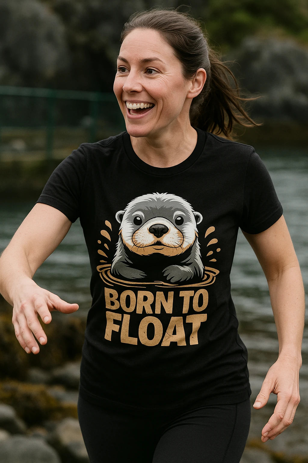"Born To Float" black sea otter t shirt, photographed as gifts for sea otter lovers