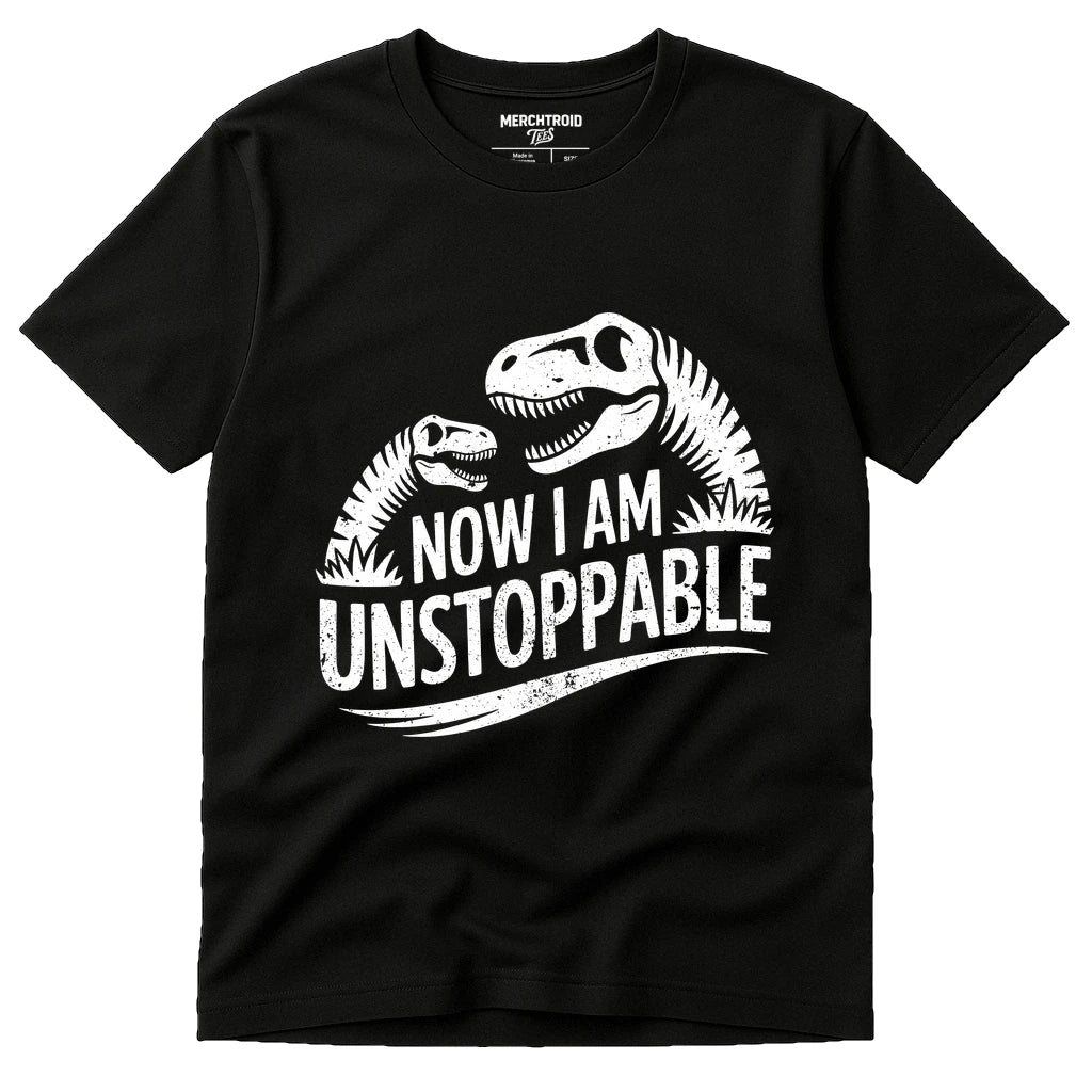 Black Paleontology Shirts - "Now I Am Unstoppable" graphic tee with white print, flat lay product photo