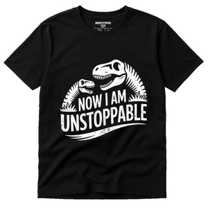 Black Paleontology Shirts - "Now I Am Unstoppable" graphic tee with white print, flat lay product photo
